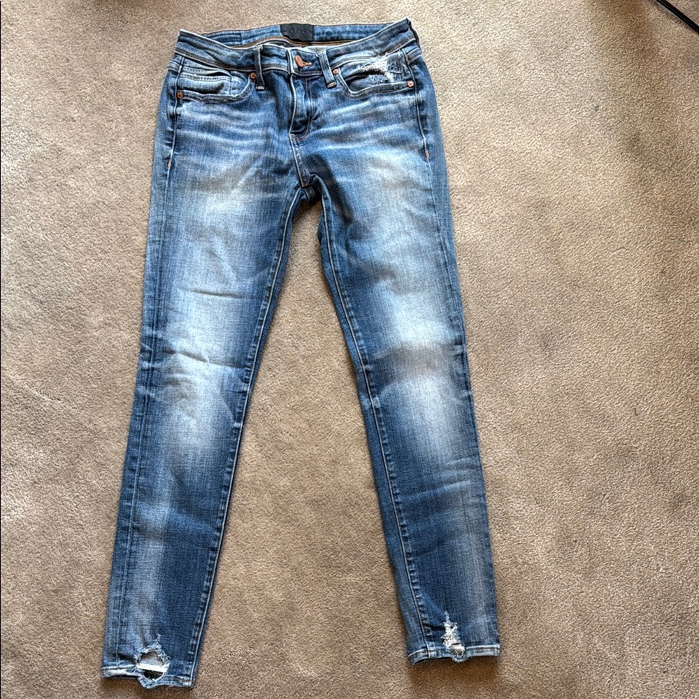 Buckle Blue Skinny Jeans with Distressed Detailing